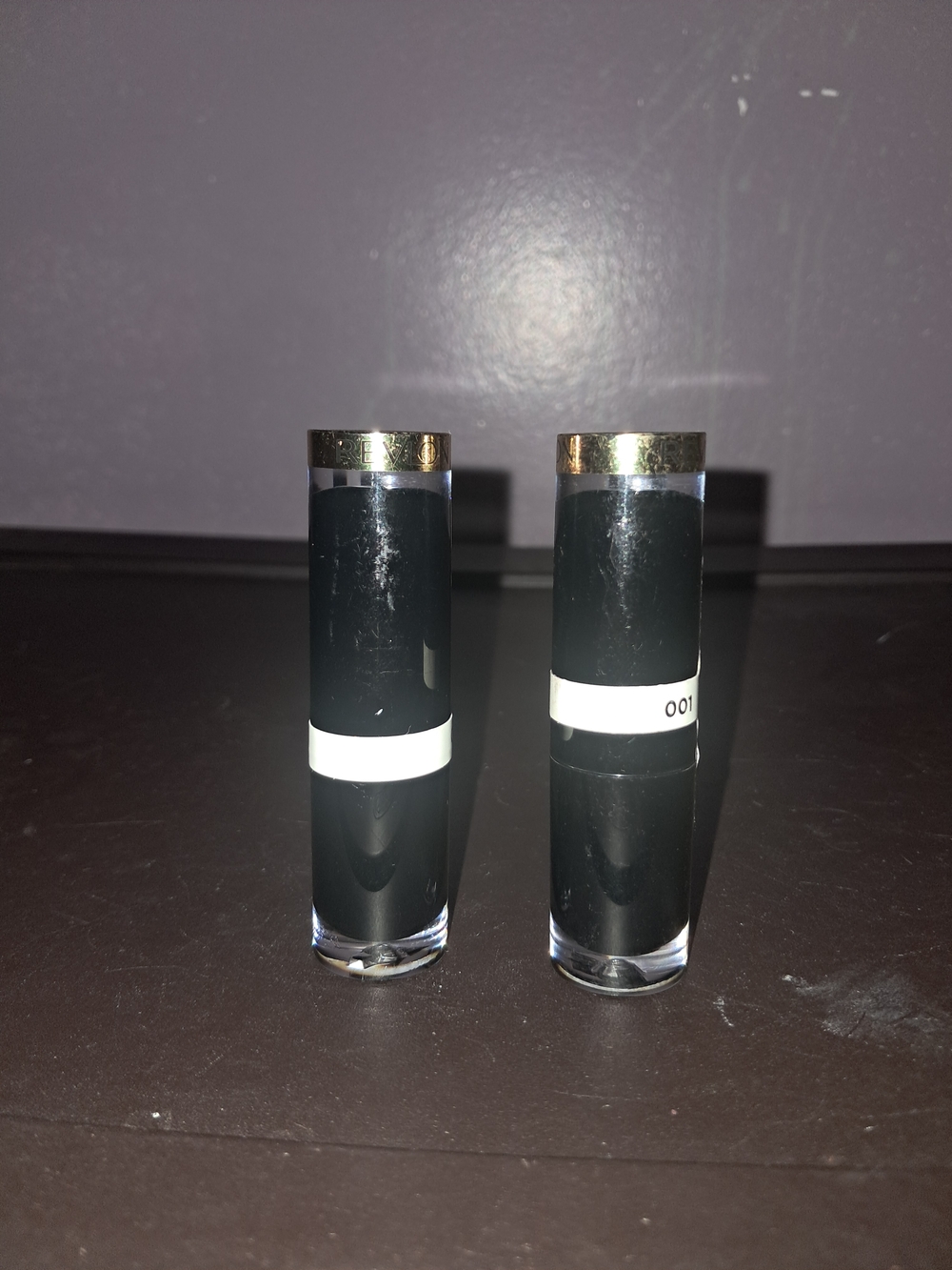 Revlon Black Lipstick Tubes with Gold Accents